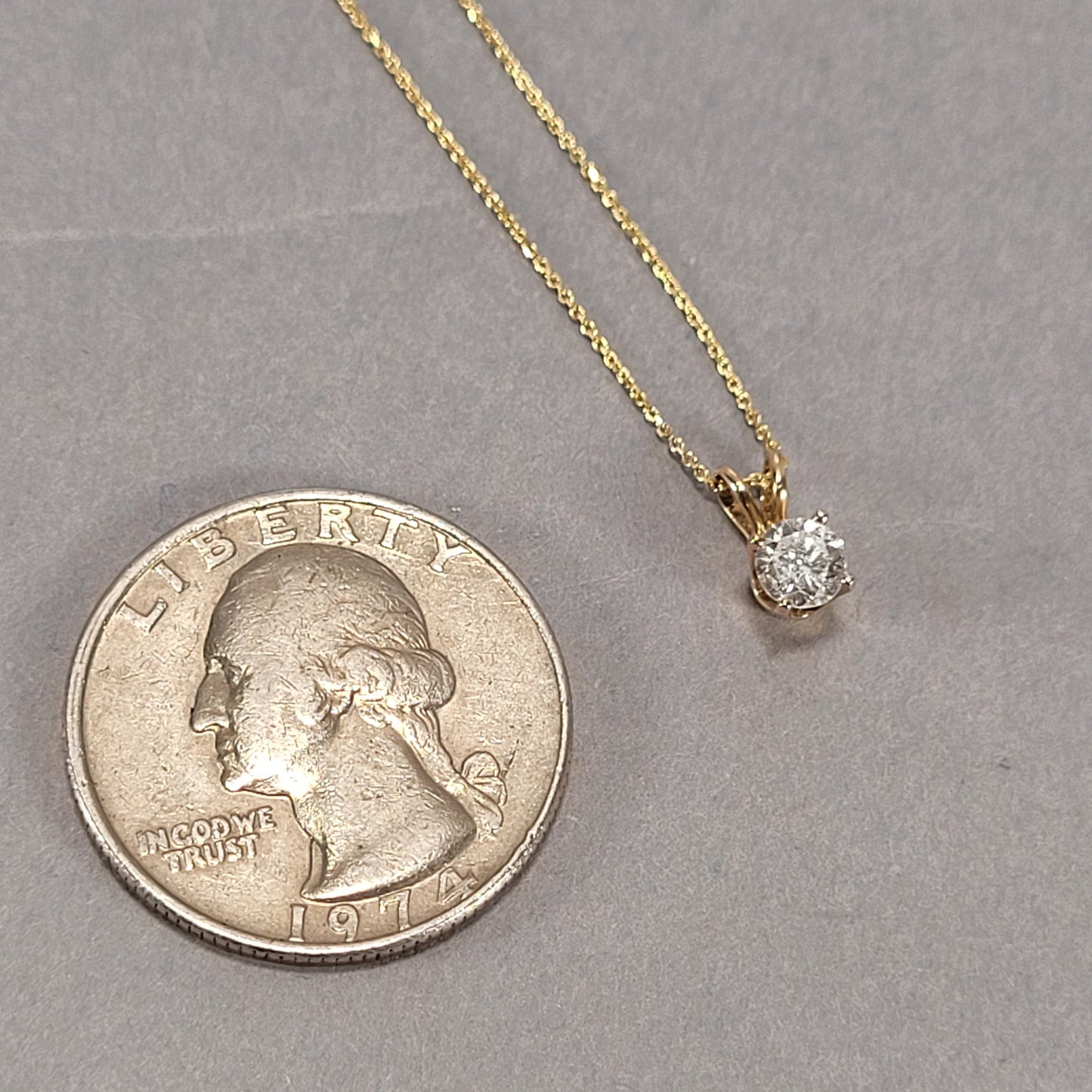 18" 14K Yellow Gold Chain & Solitaire Diamond Pendant; 1.6g