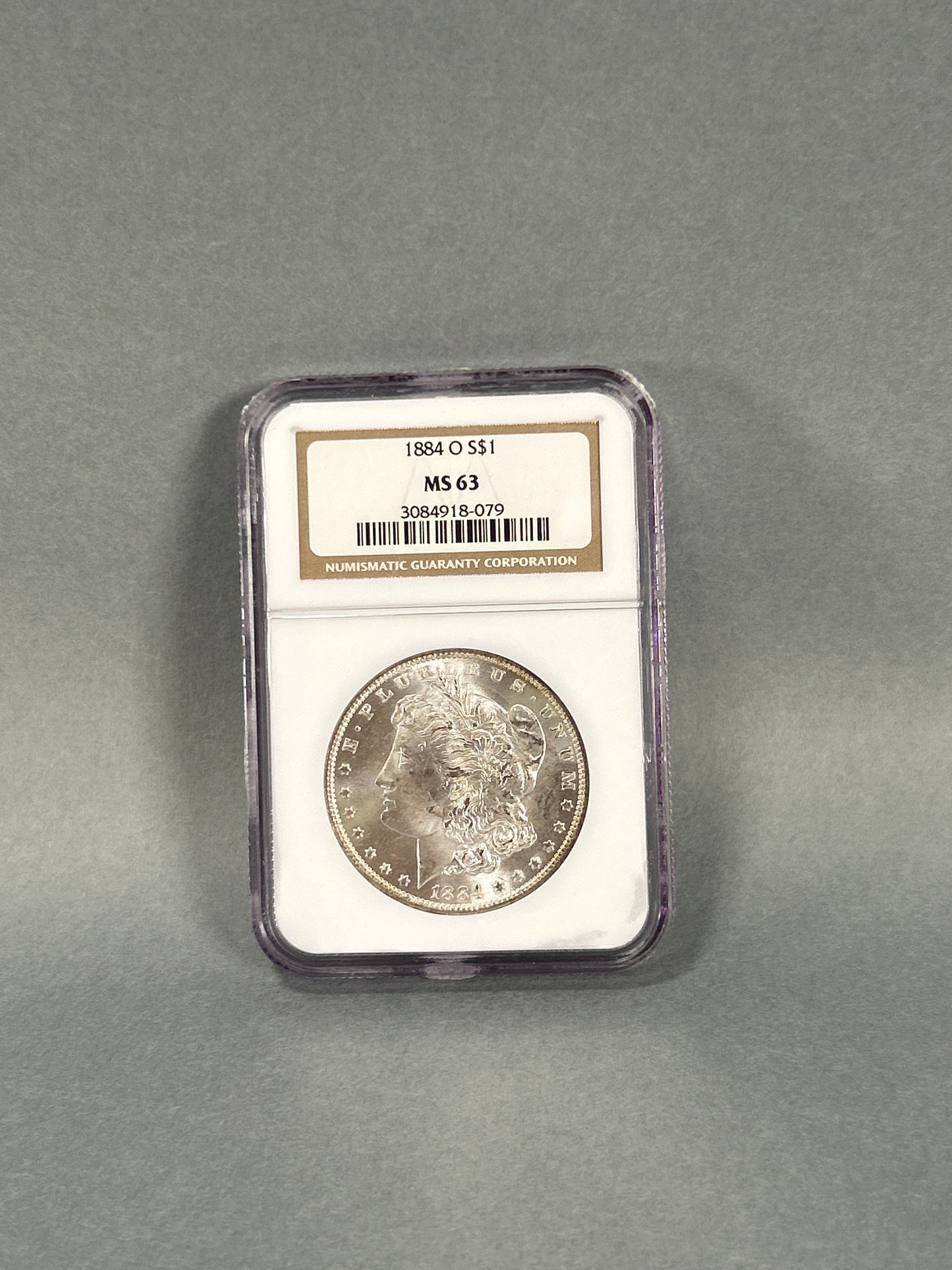 NGC Graded 1884-O Silver Morgan Dollar MS 63