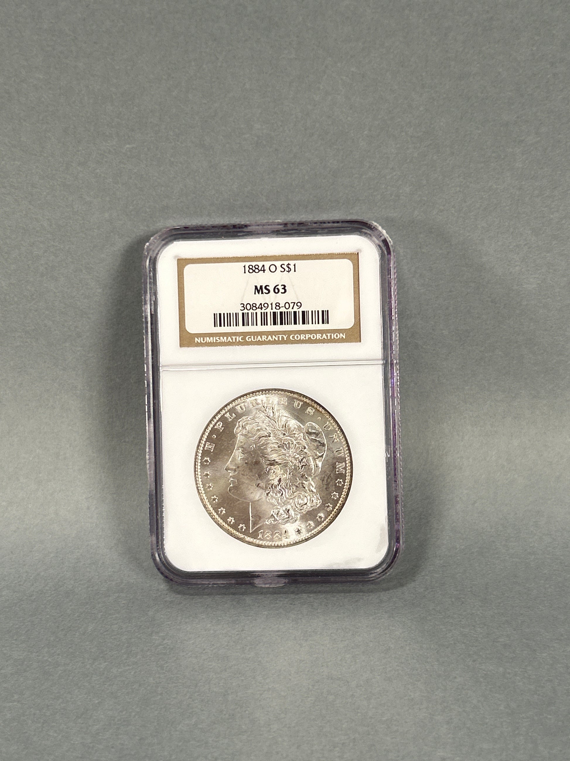 NGC Graded 1884-O Silver Morgan Dollar MS 63