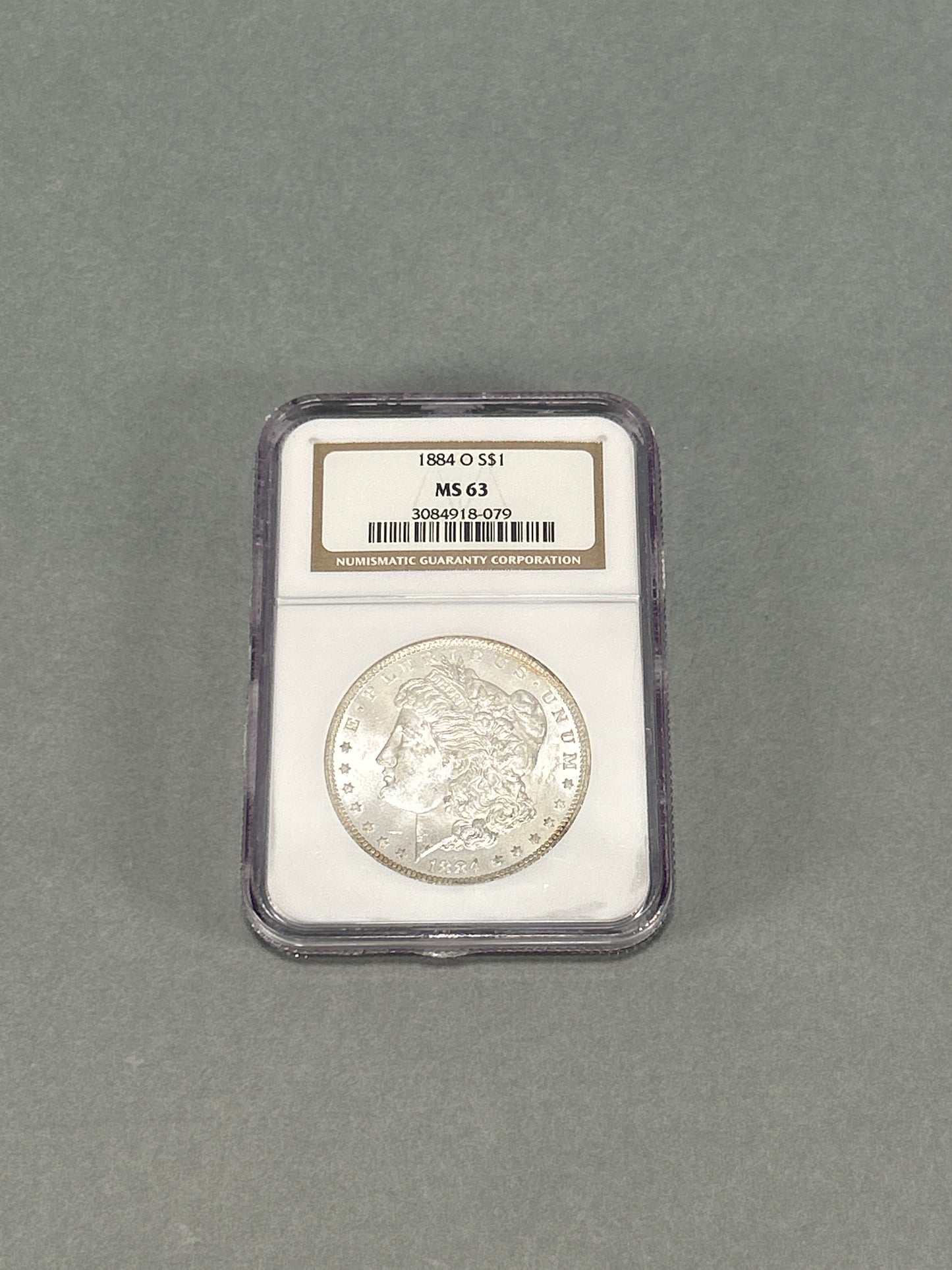 NGC Graded 1884-O Silver Morgan Dollar MS 63