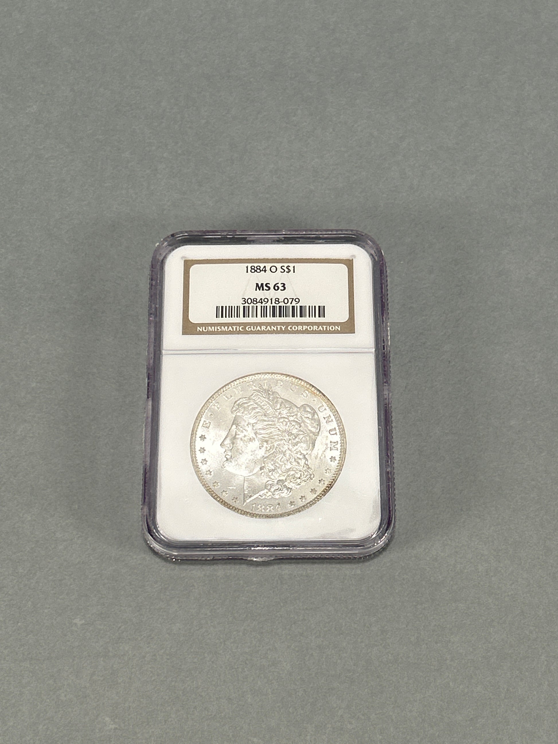 NGC Graded 1884-O Silver Morgan Dollar MS 63
