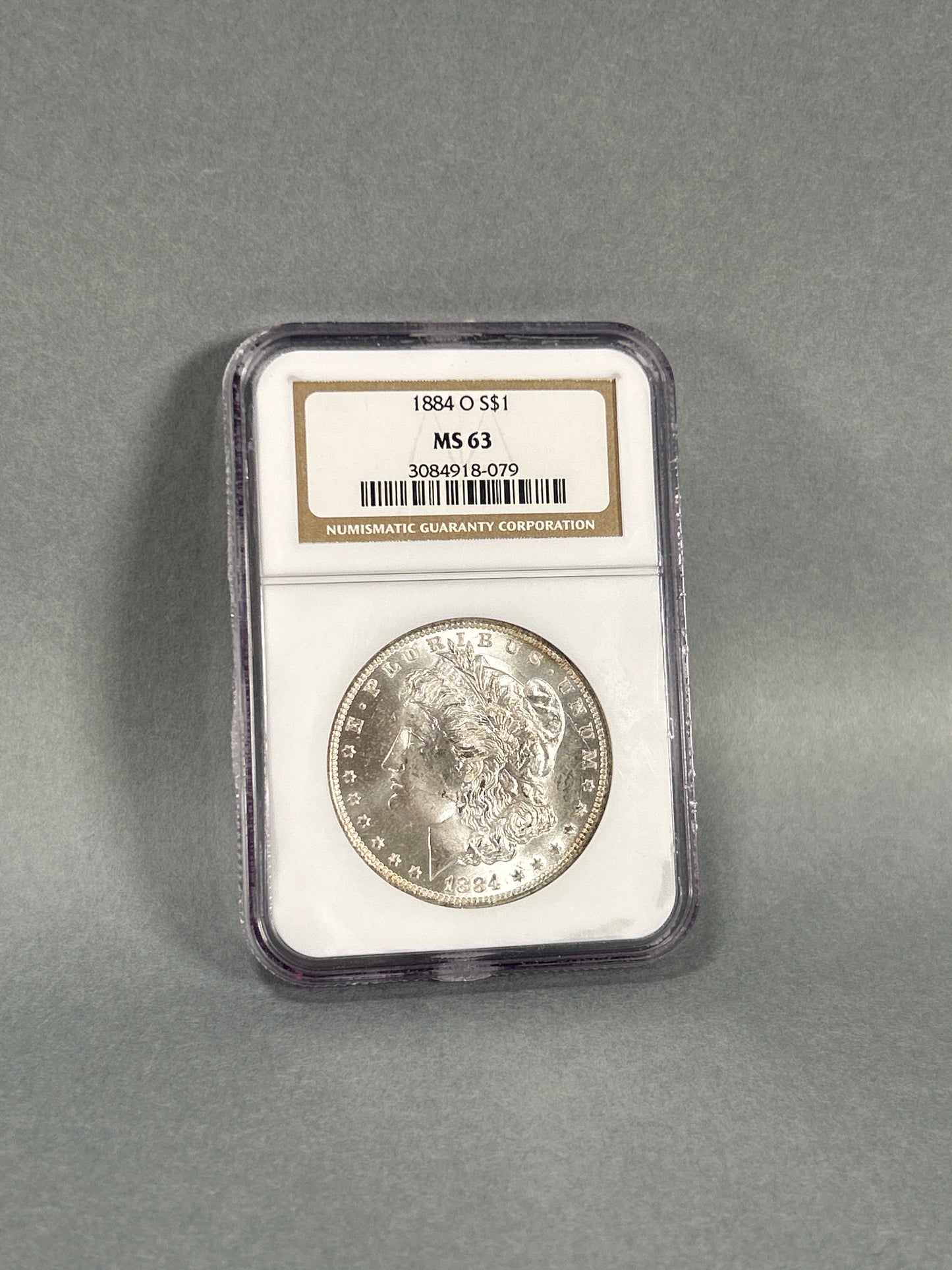 NGC Graded 1884-O Silver Morgan Dollar MS 63