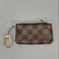 Louis Vuitton Damier Ebene Pochette Mini - Brown