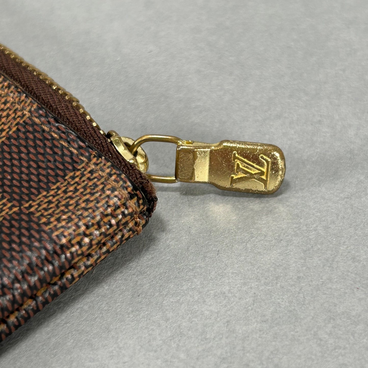 Louis Vuitton Damier Ebene Pochette Mini - Brown