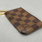 Louis Vuitton Damier Ebene Pochette Mini - Brown