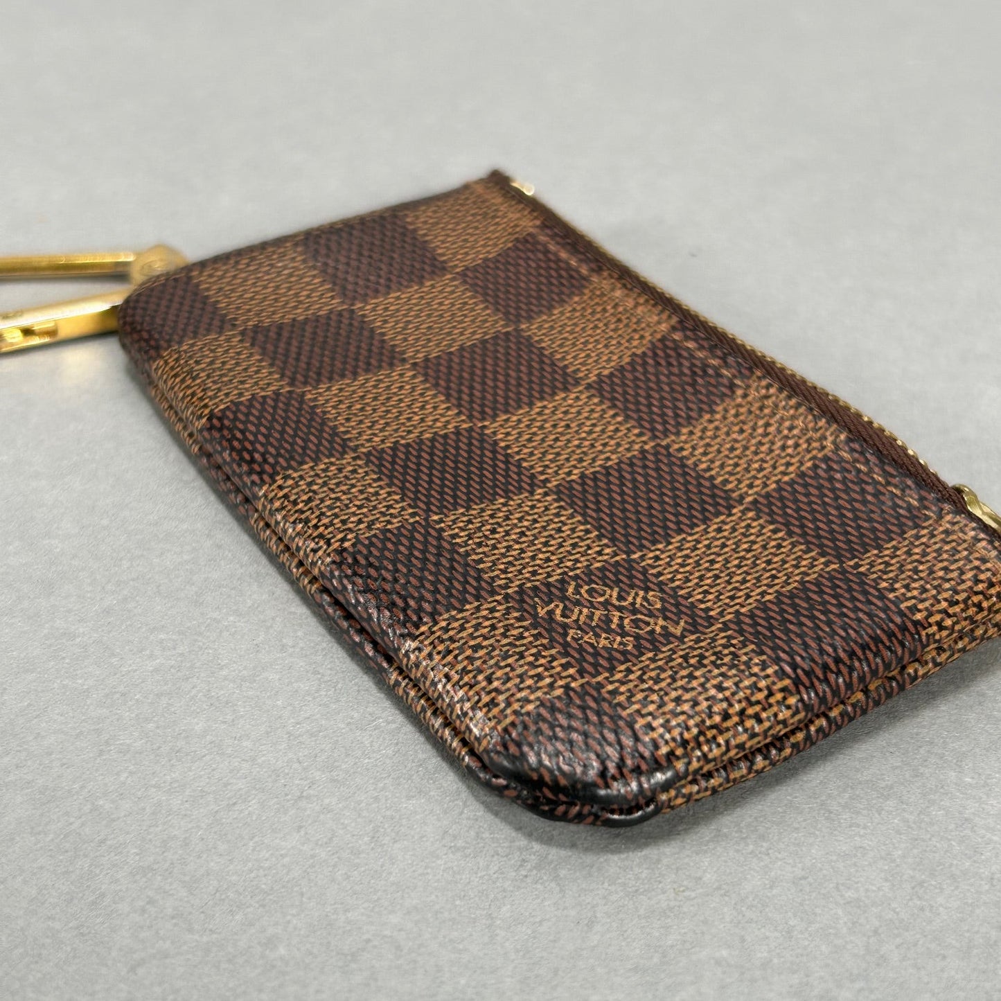 Louis Vuitton Damier Ebene Pochette Mini - Brown