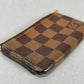 Louis Vuitton Damier Ebene Pochette Mini - Brown
