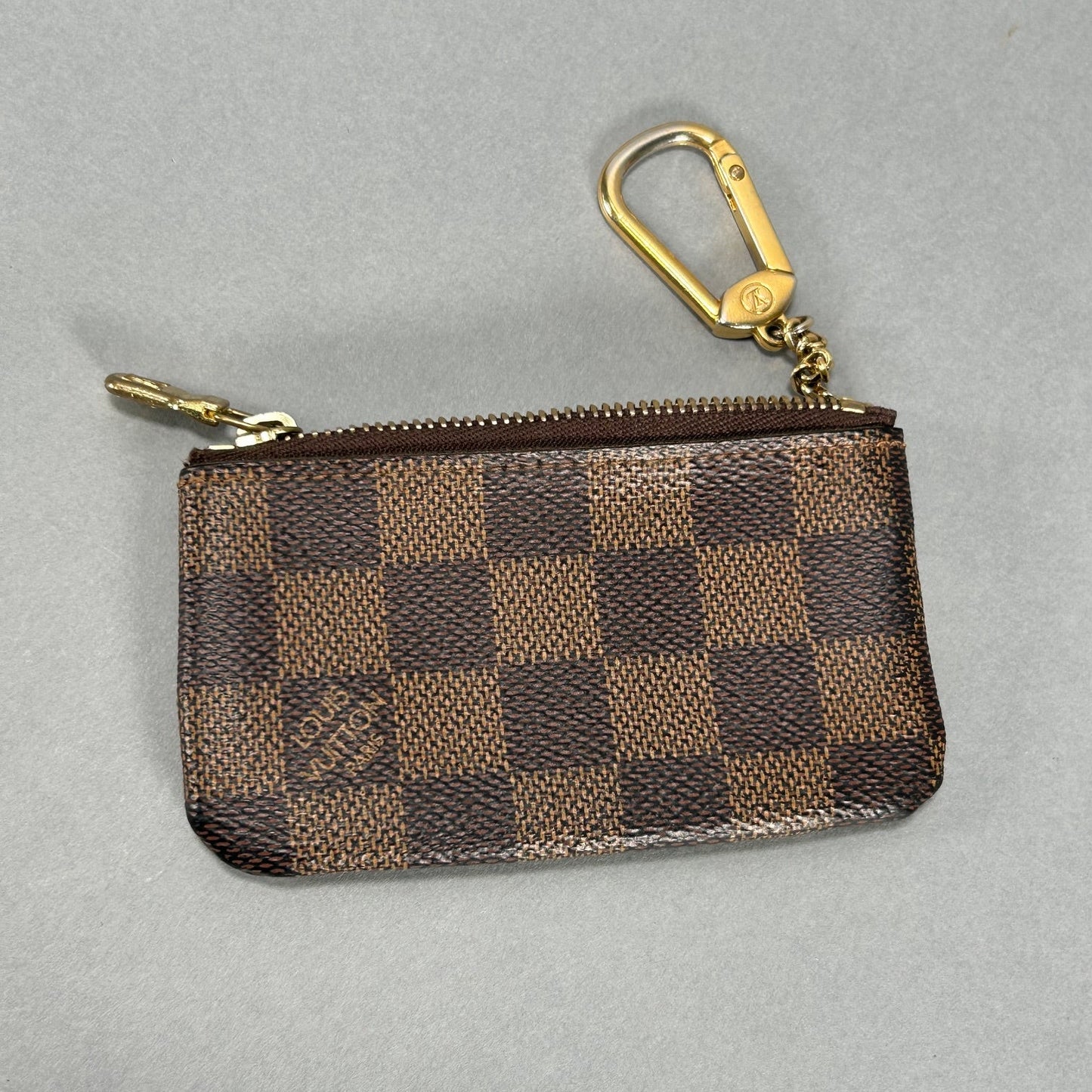 Louis Vuitton Damier Ebene Pochette Mini - Brown
