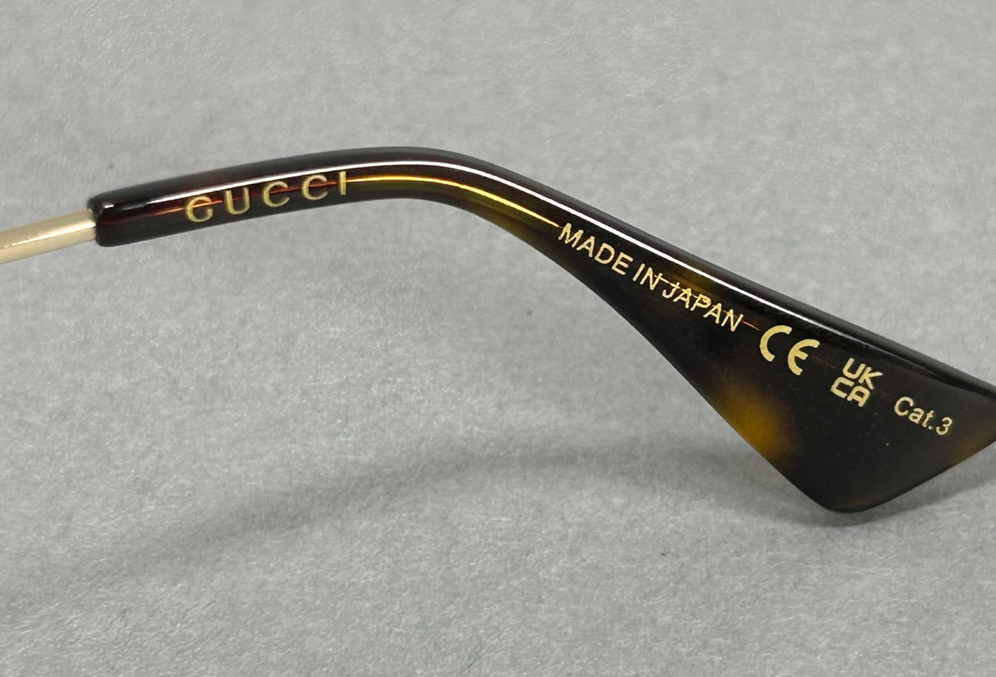 Gucci Sunglasses GG0062S 57[]17-140