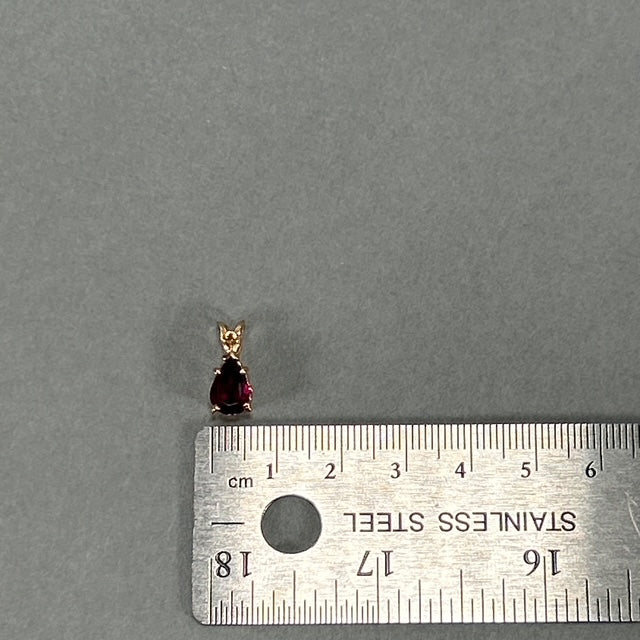 14K Yellow Gold Purple Tourmaline Pendant; 1.3g