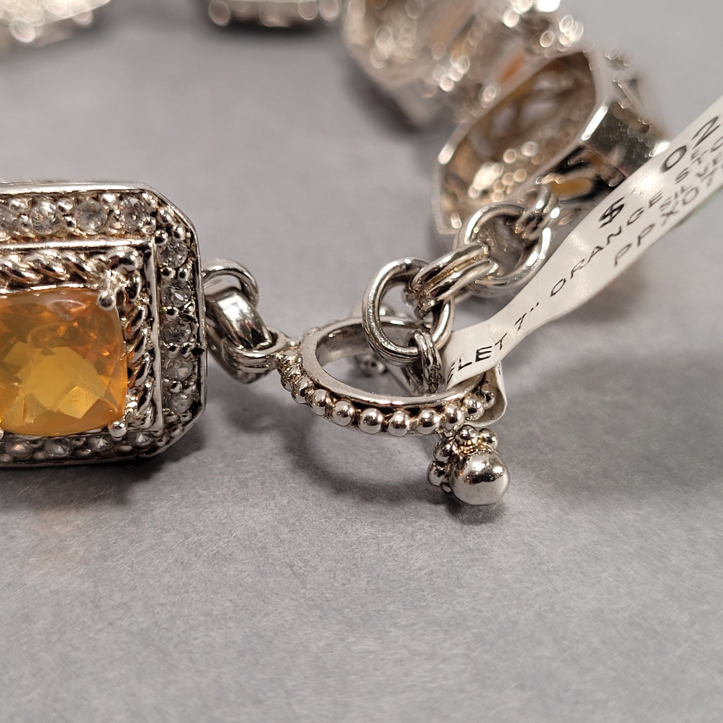 7" Sterling Silver Bracelet With Orange and Clear Stones 34g